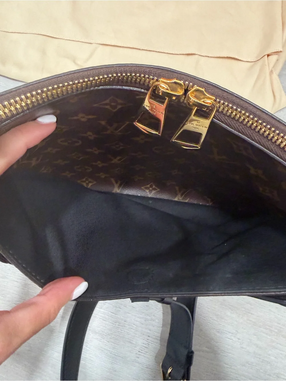 Louis Vuitton Monogram in Brown and Black. Odeon MM. Excellent condition.